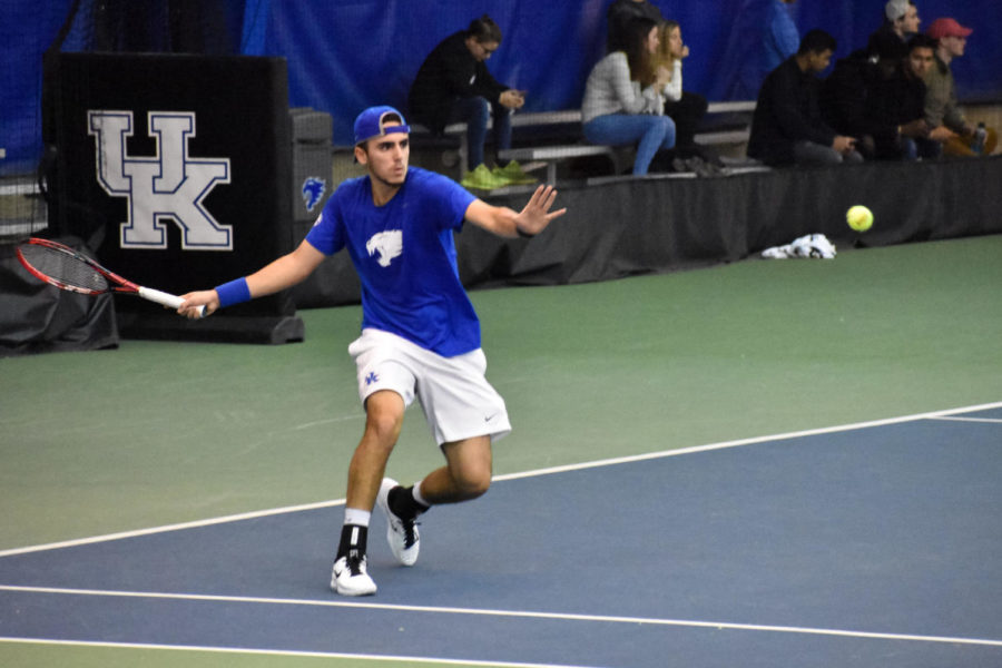 Enzo Wallart prepares for a return during his singles match against Notre Dame. Saturday, January 19, 2019 in Lexington, Kentucky. Photo by Natalie Parks | Staff