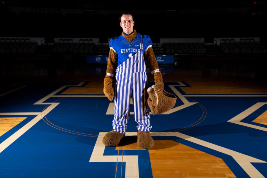 Graduating senior cheerleader and Wildcat mascot Ross Boggess poses for a photo in Memorial Coliseum on UKs campus in Lexington, Kentucky. Photo by Jordan Prather | Staff