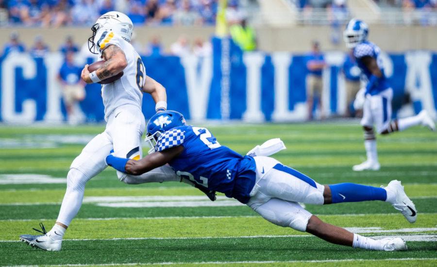 Kentucky Wildcats linebacker Chris Oats (22) chases down a defender during the UK vs Toledo football game on Saturday, Aug. 31, 2019, at Kroger Field in Lexington, Kentucky. UK won 38-24. Photo by Michael Clubb | Staff