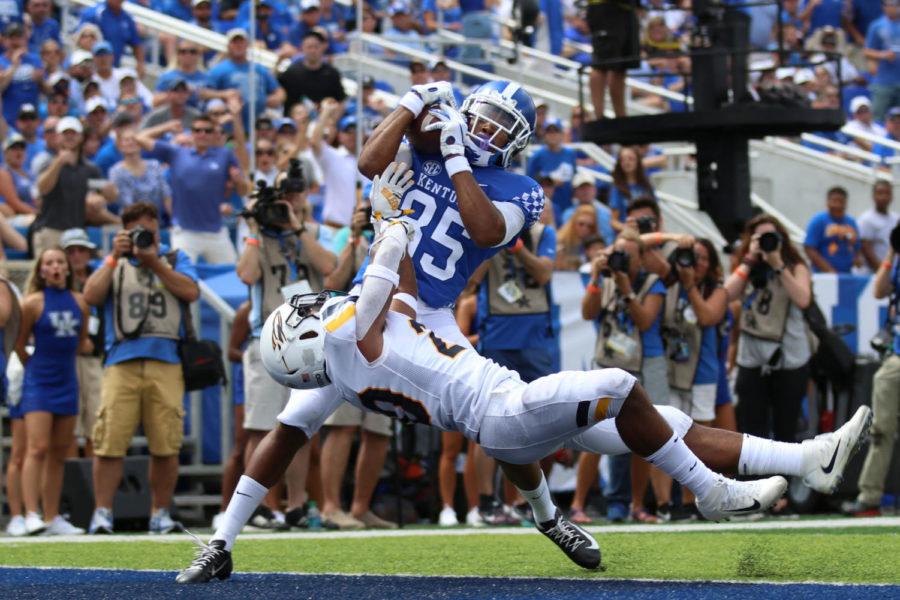 Freshman Bryce Oliver catches a touchdown pass during the game against Toledo on Saturday, August 31, 2019 in Lexington, Ky. Kentucky won 38-24. Photo by Chase Phillips | Staff