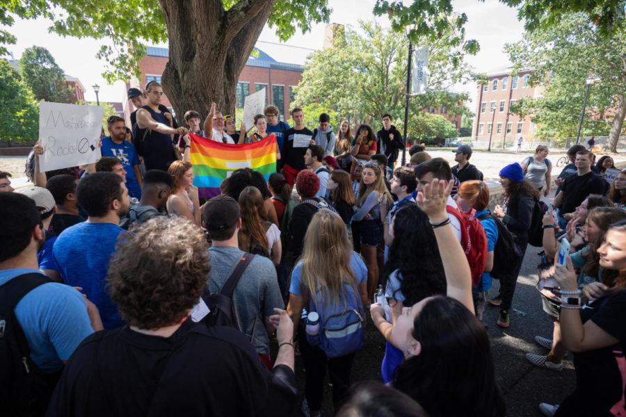 A crowd of students gather in protest around a preacher outside of Whitehall classroom building on Tuesday, Sept. 24, 2019, at the University of Kentucky in Lexington, Kentucky. Photo by Michael Clubb | Staff