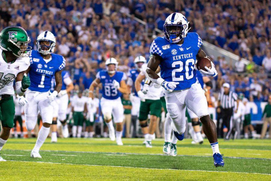 Kentucky running back Kavosiey Smoke carries the ball down the field during the game against Eastern Michigan on Saturday, Sept. 7, 2019, at Kroger Field in Lexington, Kentucky. Kentucky won 38-17. Photo by Jordan Prather | Staff