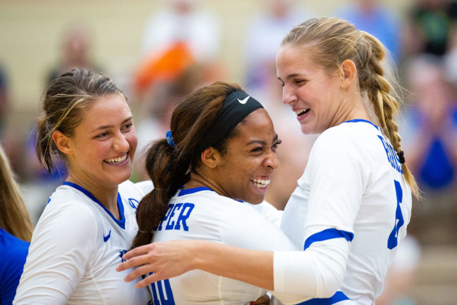 Kentucky+junior+Madison+Lilley%2C+senior+Caitlyn+Cooper+and+junior+Kendyl+Paris+celebrate+a+point+during+the+game+against+Western+Kentucky+University+on+Wednesday%2C+Aug.+21%2C+2019%2C+at+Paul+Laurence+Dunbar+High+School+in+Lexington%2C+Kentucky.+Photo+by+Jordan+Prather+%7C+Staff