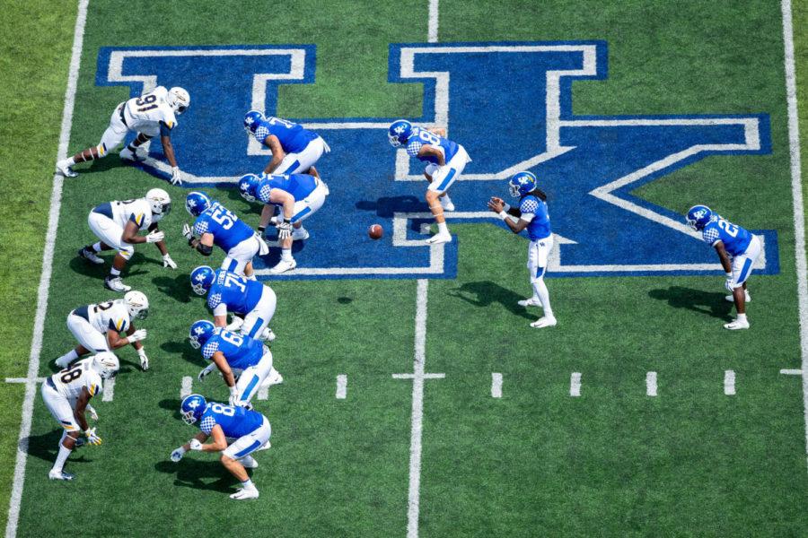 Kentucky Wildcats quarterback Terry Wilson (3) receives a snap during the UK vs Toledo football game on Saturday, Aug. 31, 2019, at Kroger Field in Lexington, Kentucky. UK won 38-24. Photo by Michael Clubb | Staff