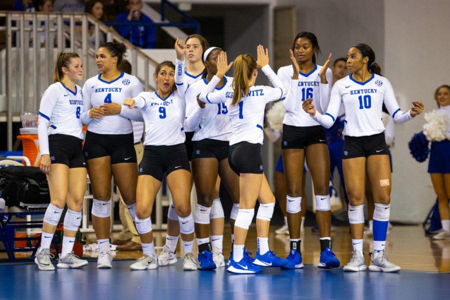 The Kentucky volleyball team dances during a break in the game against Louisville on Friday, Sept. 20, 2019, at Memorial Coliseum in Lexington, Kentucky. Kentucky won 3-0. Photo by Jordan Prather | Staff