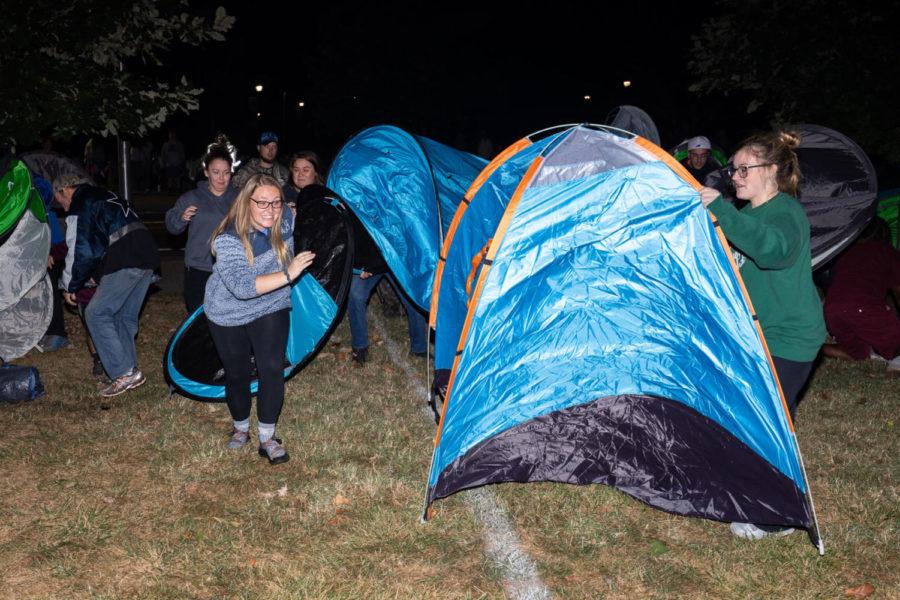 UK fans rush the lawn in front of Memorial Coliseum to camp out for Big Blue Madness tickets at 5:00am on Wednesday, Sept. 25, 2019, at the University of Kentucky in Lexington, Kentucky. Photo by Michael Clubb | Staff
