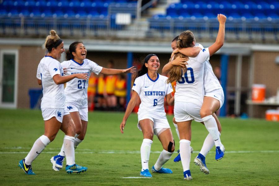 Kentucky womens soccer players celebrate a goal by freshman forward Jordyn Rhodes during the game against Western Bowling Green State University on Thursday, Aug. 22, 2019, at the Bell Soccer Complex in Lexington, Kentucky. The game ended in a tie with a score of 3-3. Photo by Jordan Prather | Staff