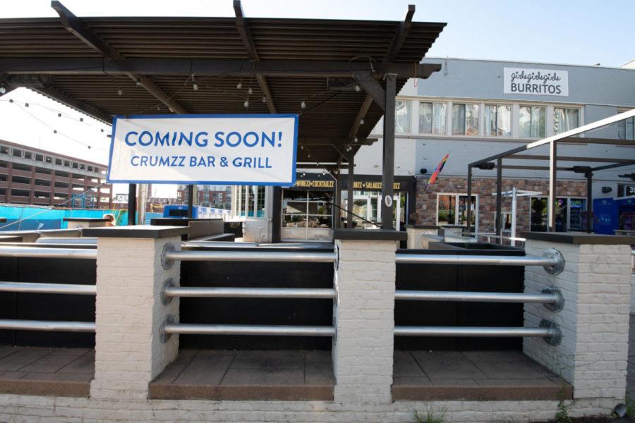 A sign advertises the soon to be opened Crumzz Bar & Grill in Lexington, Kentucky. Photo by Jordan Prather | Staff