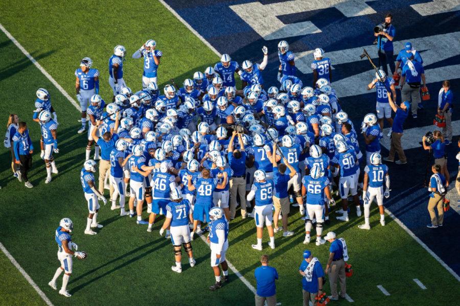 UK huddles up before the UK vs. Eastern Michigan University football game on Saturday, Sept. 7, 2019, at the University of Kentucky in Lexington, Kentucky. UK won 38-17. Photo by Michael Clubb | Staff