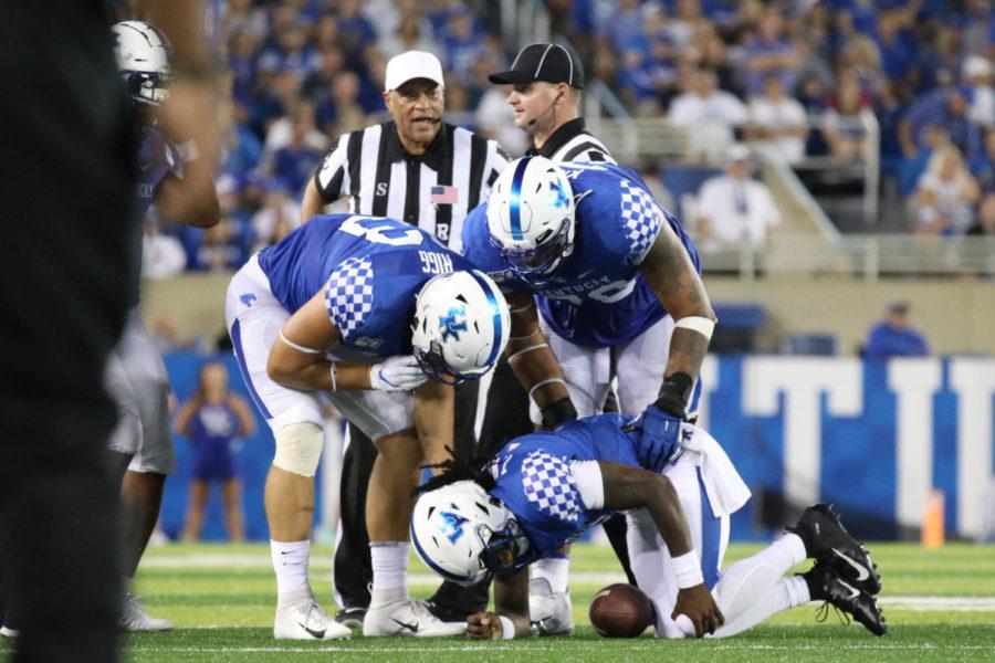 Quarterback Terry Wilson goes down with an injury during the game against Eastern Michigan on Saturday, September 7, 2019 in Lexington, Ky. Kentucky won 38-17. Photo by Chase Phillips | Staff