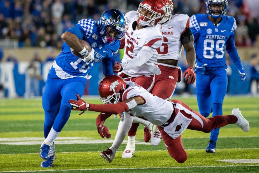 Kentucky Wildcats running back AJ Rose (10) breaks free from a tackle during the UK vs Arkansas football game on Saturday, Oct. 12, 2019, at Kroger Field in Lexington, Kentucky. UK won 24-20. Photo by Michael Clubb | Staff