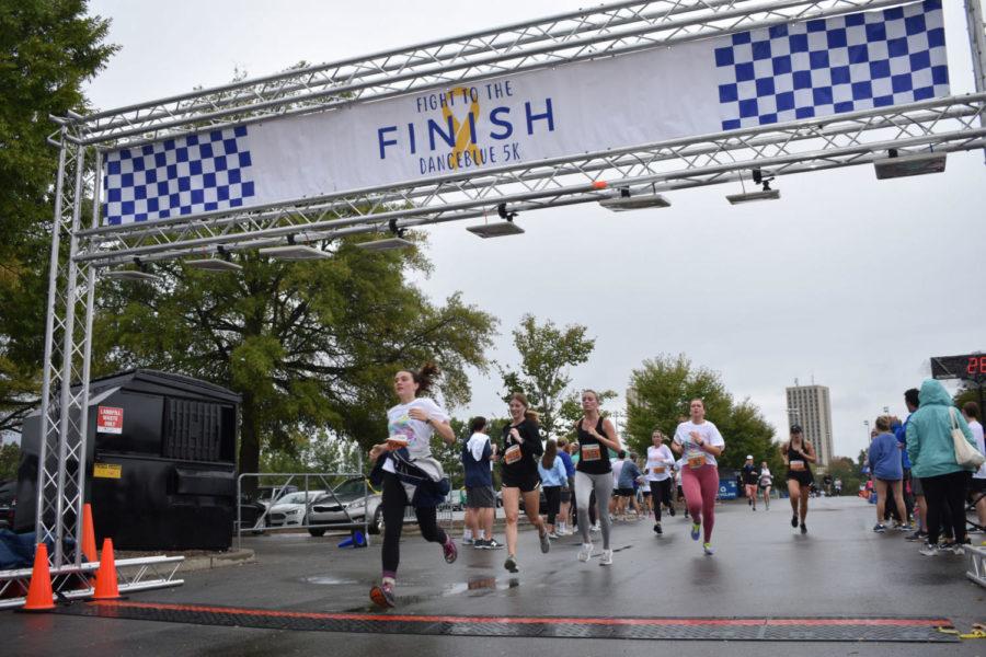 Runners approach the finish line of DanceBlues annual 5k on Sunday, October 6, 2019 in Lexington, Kentucky. Photo by Natalie Parks | Staff