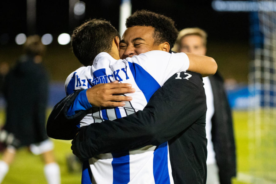 Kentucky sophomore forward Jason Reyes hugs a teammate after the University of Kentucky vs. Loyola-Chicago NCAA Tournament soccer game on Thursday, Nov. 21, 2019, at The Bell Soccer Complex in Lexington, Kentucky. UK won 2-1 in the second overtime period. Photo by Michael Clubb | Staff