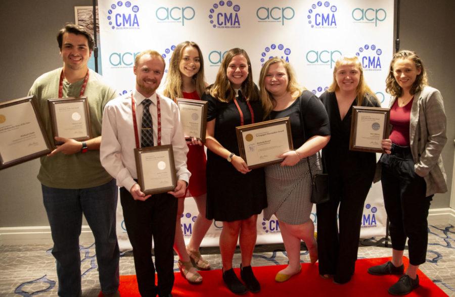 Kentucky Kernel staff and alumni hold their Associated Collegiate Press awards on Saturday, Nov. 2, 2019, at the National College Media Convention in Washington D.C.