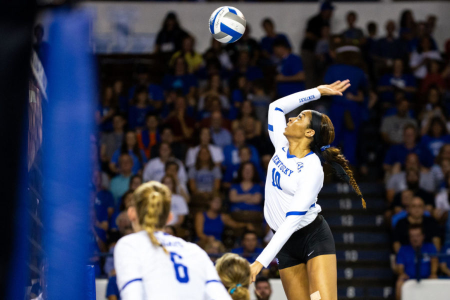 Kentucky senior Caitlyn Cooper spikes the ball during the game against Louisville on Friday, Sept. 20, 2019, at Memorial Coliseum in Lexington, Kentucky. Kentucky won 3-0. Photo by Jordan Prather | Staff