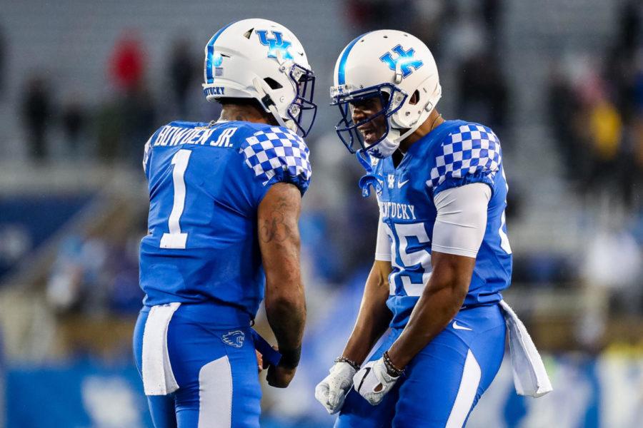 Kentucky Wildcats quarterback Lynn Bowden Jr. (1) and Kentucky Wildcats wide receiver Bryce Oliver (85) celebrate after a UK touchdown during the University of Kentucky vs. UT Martin football game on Saturday, Nov. 23, 2019, at Kroger Field in Lexington, Kentucky. UK won 50-7. Photo by Michael Clubb | Staff