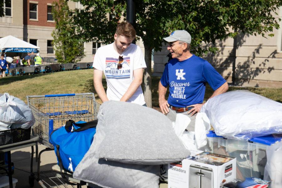UK president Eli Capilouto talks with a student during UK Fall Move-In 2019 on Wednesday, Aug. 21, 2019, at the University of Kentucky in Lexington, Kentucky. Photo by Michael Clubb | Staff