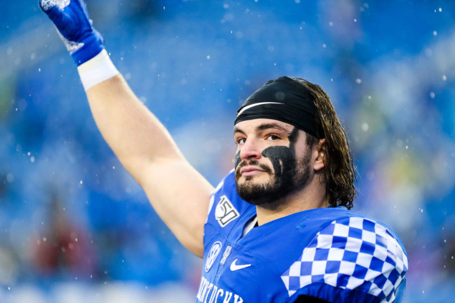 Kentucky+Wildcats+linebacker+Kash+Daniel+%2856%29+waves+to+the+crowd+during+the+senior+day+ceremony+before+the+University+of+Kentucky+vs.+University+of+Louisville+Governor%E2%80%99s+Cup+football+game+on+Saturday%2C+Nov.+30%2C+2019%2C+at+Kroger+Field+in+Lexington%2C+Kentucky.+UK+won+45-13.+Photo+by+Michael+Clubb+%7C+Staff