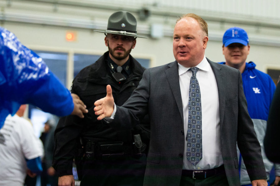 Kentucky head coach Mark Stoops shakes hands with fans at Cat Walk before the Governors Cup game against Louisville on Saturday, Nov. 30, 2019, at Kroger Field in Lexington, Kentucky. Kentucky won 45-13. Photo by Jordan Prather | Staff