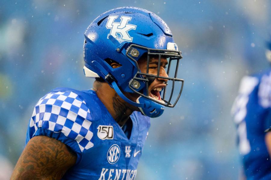Kentucky Wildcats quarterback Lynn Bowden Jr. (1) screams after scoring a touchdown during the University of Kentucky vs. University of Louisville Governor’s Cup football game on Saturday, Nov. 30, 2019, at Kroger Field in Lexington, Kentucky. UK won 45-13. Photo by Michael Clubb | Staff