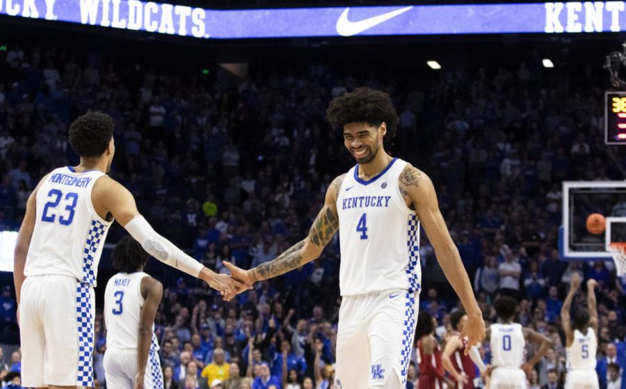 Kentucky junior forward Nick Richards smiles as he shakes hands with sophomore forward EJ Montgomery during the UK vs. University of Alabama basketball game on Saturday, January 11, 2020, at Rupp Arena in Lexington, Kentucky. UK defeated Alabama 76-67. Photo by Rick Childress | Staff