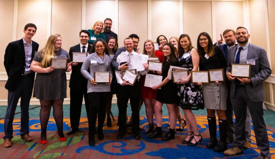 Kernel staffers, advisers and alumni pose with their awards after the 151st Kentucky Press Association awards banquet on Friday, Jan. 24, 2020, in the Hilton Inn in downtown Lexington, Ky. Photo by Kakie Urch.