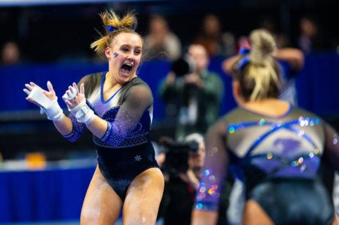 Kentucky freshman Raena Worley celebrates after her routine on the bars during the Excite Night meet against Missouri on Friday, Jan. 10, 2020, at Rupp Arena in Lexington, Kentucky. Kentucky won 196.525-195.500. Photo by Jordan Prather | Staff