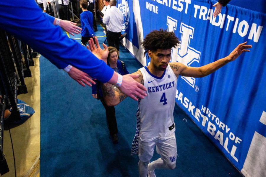 Kentucky junior forward Nick Richards high fives fans as he heads to the locker room after the game against Mississippi State on Tuesday, Feb. 4, 2020, at Rupp Arena in Lexington, Kentucky. Kentucky won 80-72. Photo by Jordan Prather | Staff
