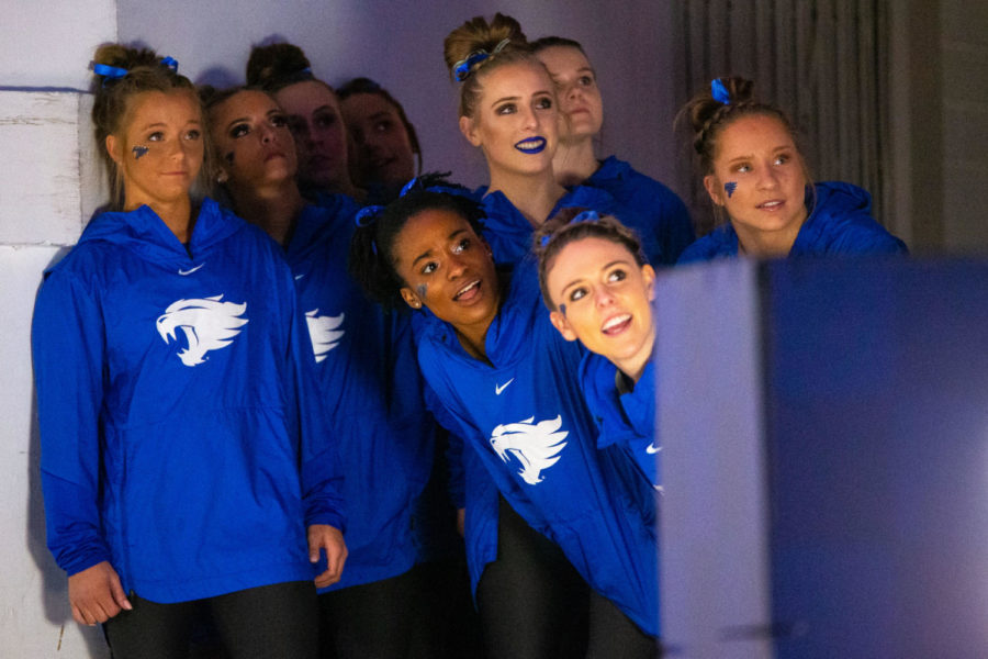 The Kentucky gymnastics team watches their hype video from the tunnel before the meet against Georgia on Friday, Feb. 21, 2020, at Memorial Coliseum in Lexington, Kentucky. Georgia won 197.050-196.825. Photo by Jordan Prather | Staff