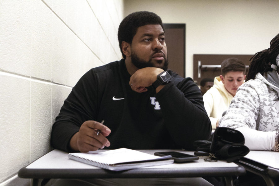 Ricky Lumpkin concentrates on the lecture that his professor is giving on Friday, Feb. 7, 2020, in the White Hall classroom building in Lexington, Kentucky. Photo by Victoria Rogers | Staff