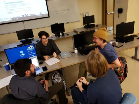 Rafael Estrada, Sam Morris, Michael Probst and Caleb Geyer work on Singularity, their game for the Global Game Jam Event in late January on the the Bluegrass Community & Technical Colleges Newtown campus in Lexington, Ky. Photo provided by Ryan Whitt.