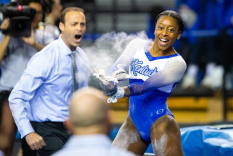 Kentucky sophomore Cally Nixon celebrates her performance on the bars during the meet against the University of Florida on Friday, Jan. 31, 2020, at Memorial Coliseum in Lexington, Kentucky. Florida won 197.8-196.6. Photo by Jordan Prather | Staff