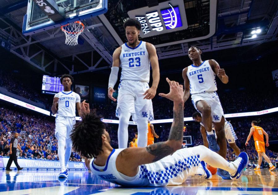 Kentucky sophomore guard Ashton Hagans, sophomore forward EJ Montgomery and sophomore guard Immanuel Quickley rush over to help junior forward Nick Richards to his feet during the game against Tennessee on Tuesday, March 3, 2020, at Rupp Arena in Lexington, Kentucky. Tennessee won 81-73. Photo by Jordan Prather | Staff