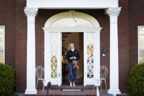 UK sophomore music major Katherine Goble poses for a portrait on her front porch on Thursday, April 16, 2020, in Lexington, Kentucky. Photo by Arden Barnes | Staff