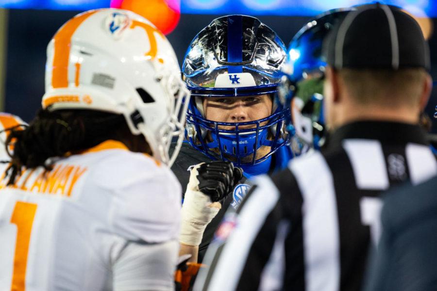 Kentucky guard Logan Stenberg fist-bumps Tennessee players after the coin-toss prior to the game against Tennessee on Saturday, Nov. 9, 2019, at Kroger Field in Lexington, Kentucky. Tennessee won 17-13. Photo by Jordan Prather | Staff
