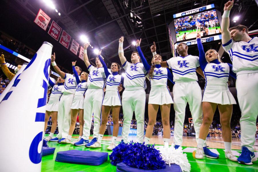 The+Kentucky+Wildcat+cheerleaders+stand+on+the+court+for+the+playing+of+My+Old+Kentucky+Home+following+the+game+against+Wofford+in+the+second+round+of+the+NCAA+tournament+on+Saturday%2C+March+23%2C+2019%2C+at+VyStar+Veterans+Memorial+Arena+in+Jacksonville%2C+Florida.+Photo+by+Jordan+Prather+%7C+Staff