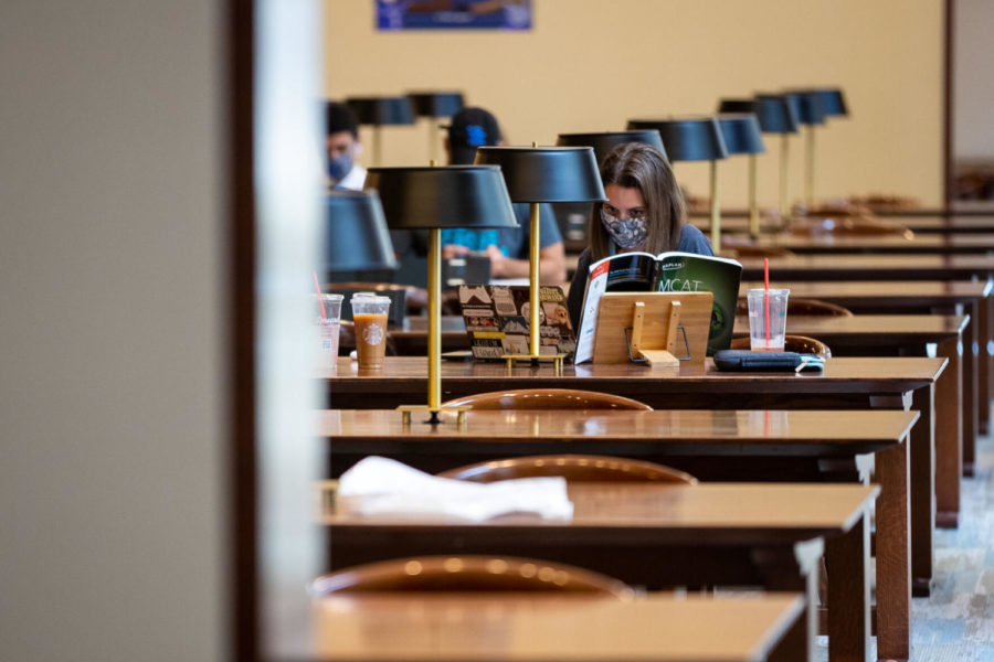 A student studies in the William T. Young Library on Monday, Aug. 17, 2020, at the University of Kentucky in Lexington, Kentucky. Photo by Michael Clubb | Staff