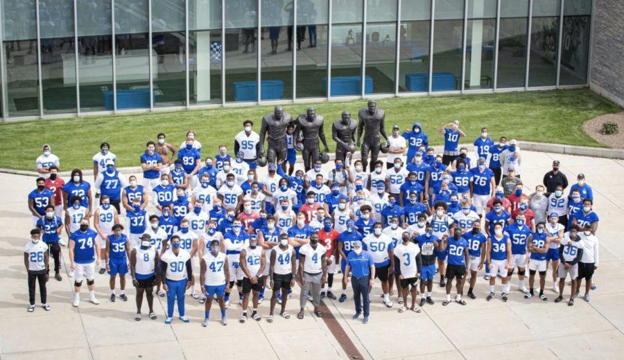 Kentucky+football+players+stand+in+unison+with+statues+of+Nate+Northington%2C+Greg+Paige%2C+Wilbur+Hackett+and+Houston+Hogg+while+protesting+social+injustice.+The+Cats+canceled+their+Thursday+afternoon+practice+to+protest+the+ongoing+social+injustice+in+the+United+States.Image+obtained+from+the+official+Kentucky+Football+Twitter+account+%28%40UKFootball%29