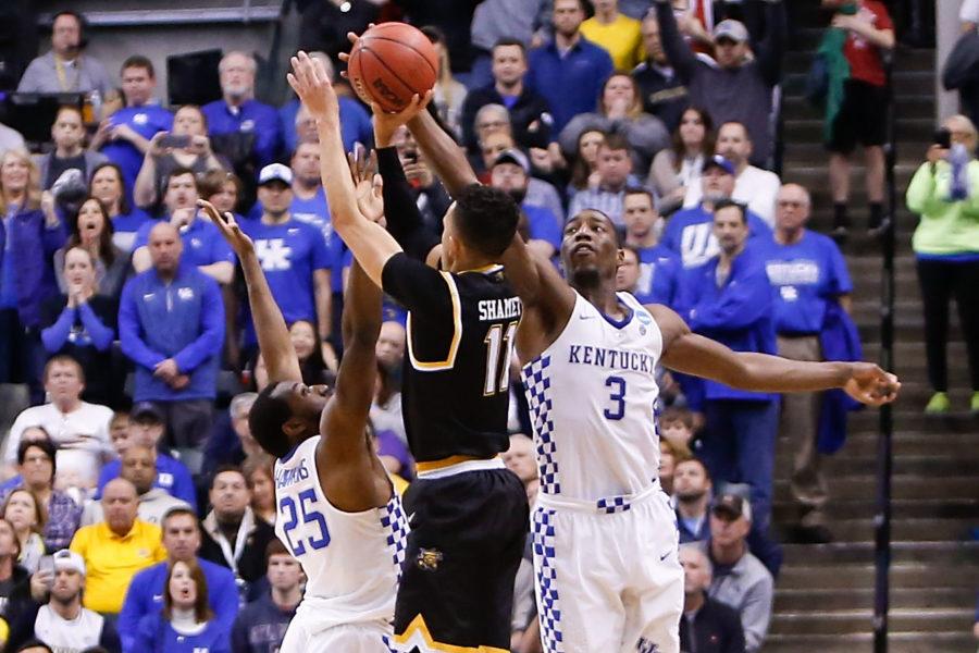 Kentucky+Wildcats+forward+Bam+Adebayo+blocks+a+three+pointer+by+Wichita+State+Shockers+guard+Landry+Shamet+with+0.5+seconds+in+the+second+round+game+of+the+2017+NCAA+Tournament+at+Bankers+Life+Fieldhouse+in+Indianapolis%2C+IN+on+Sunday%2C+March+19%2C+2017.+Photo+by+Michael+Reaves+%7C+Staff