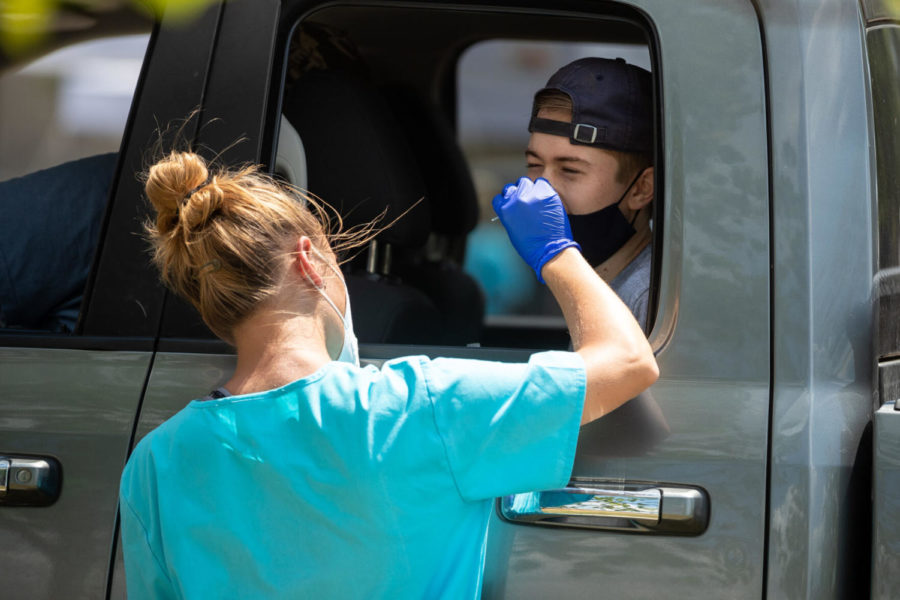 University of Kentucky students get tested for COVID-19 at a drive through testing site on Sunday, Aug. 16, 2020, at Kroger Field in Lexington, Kentucky. Photo by Michael Clubb | Staff