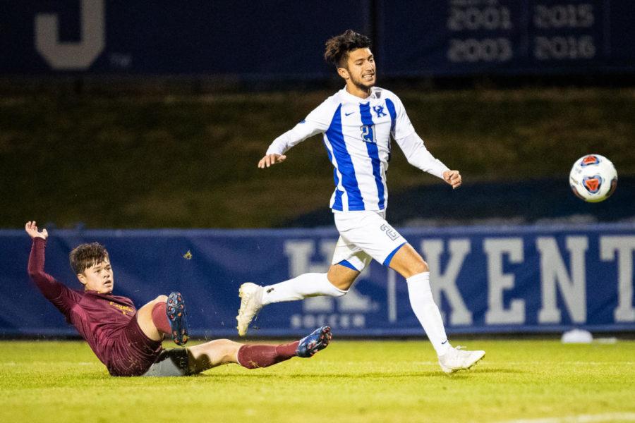 Kentucky junior midfielder Kalil ElMedkhar pushes the ball up field past a defender during the University of Kentucky vs. Loyola-Chicago NCAA Tournament soccer game on Thursday, Nov. 21, 2019, at The Bell Soccer Complex in Lexington, Kentucky. UK won 2-1 in the second overtime period. Photo by Michael Clubb | Staff