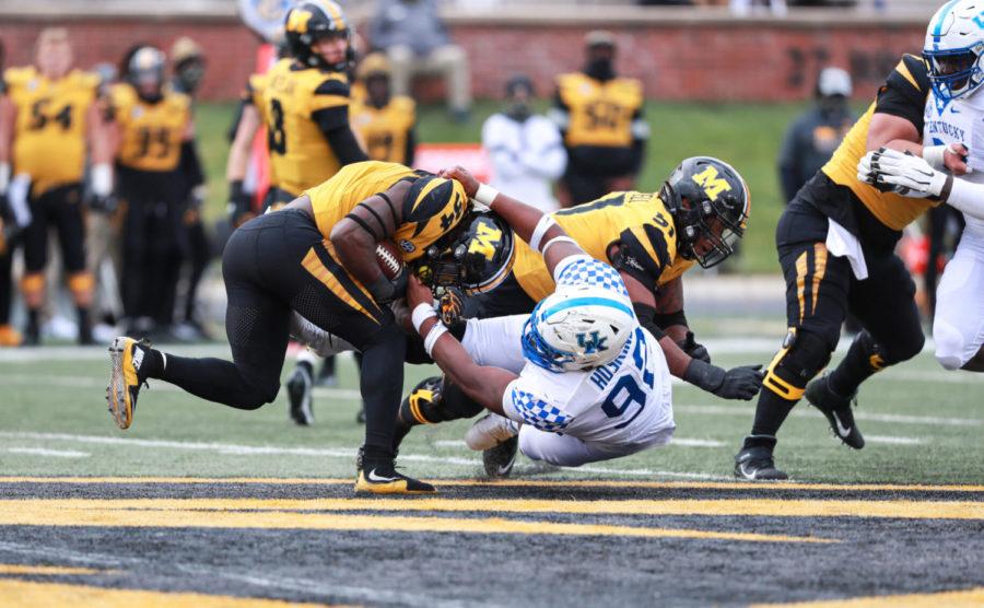 Phil Hoskins tackles a Missouri ball carrier.Image obtained from SEC Media Portal; no specific photographer found/listed.Filename 1024220_Kentucky_Hoskins.jpg
