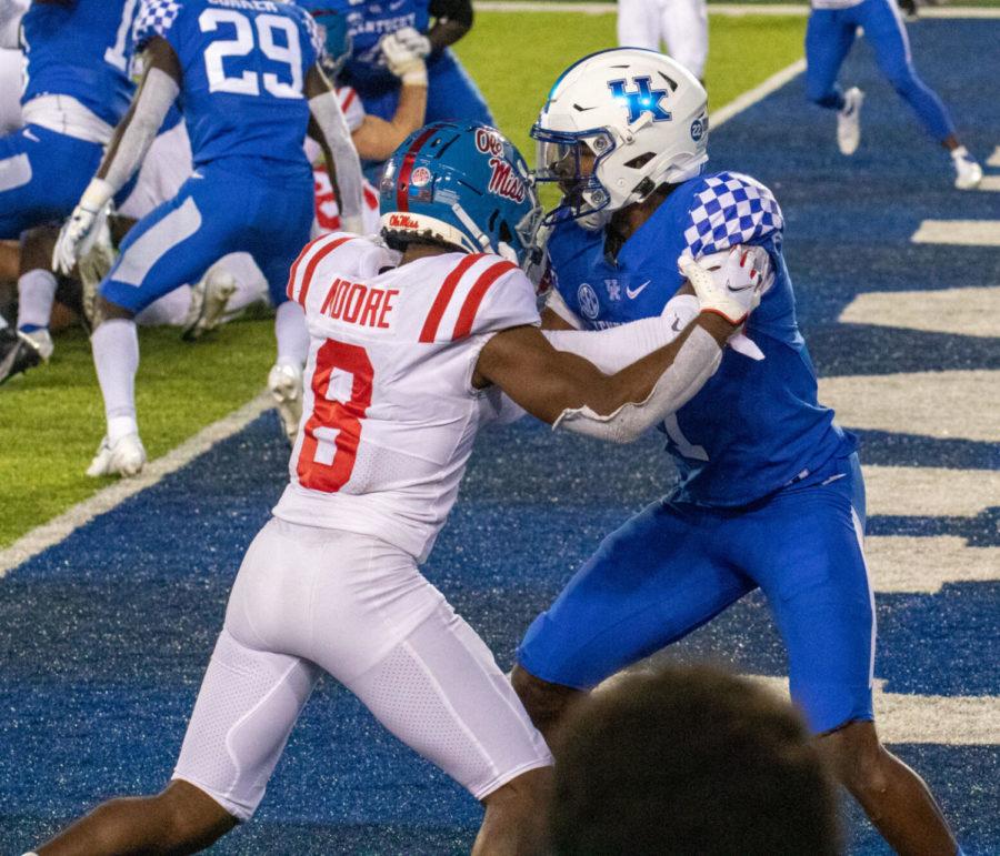 UK cornerback Kelvin Joseph (1) holds Elijah Moore (8) so he can’t catch the ball in the end zone during the University of Kentucky vs Ole Miss football game on Saturday, Oct. 3, 2020, at Kroger Field in Lexington, Kentucky. UK lost 41-42. Photo by Victoria Rogers | Staff