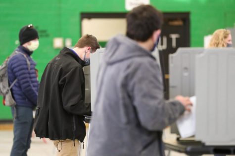 Lexington voters fill out their ballots at the Dunbar Community Center polling location on Nov. 3, 2020, in Lexington, Kentucky. Photo by Michael Clubb | Staff.