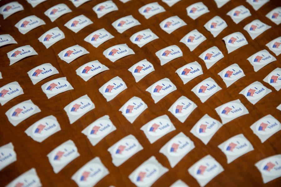 I Voted stickers are laid out for voters on Tuesday, Nov. 3, 2020, at a polling place in Lexington, Kentucky. Photo by Jack Weaver | Staff