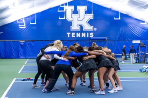 Kentuckys womens tennis team huddles before its match with Memphis.IMAGE OBTAINED FROM UK ATHLETICS. PHOTO BY GRANT LEE