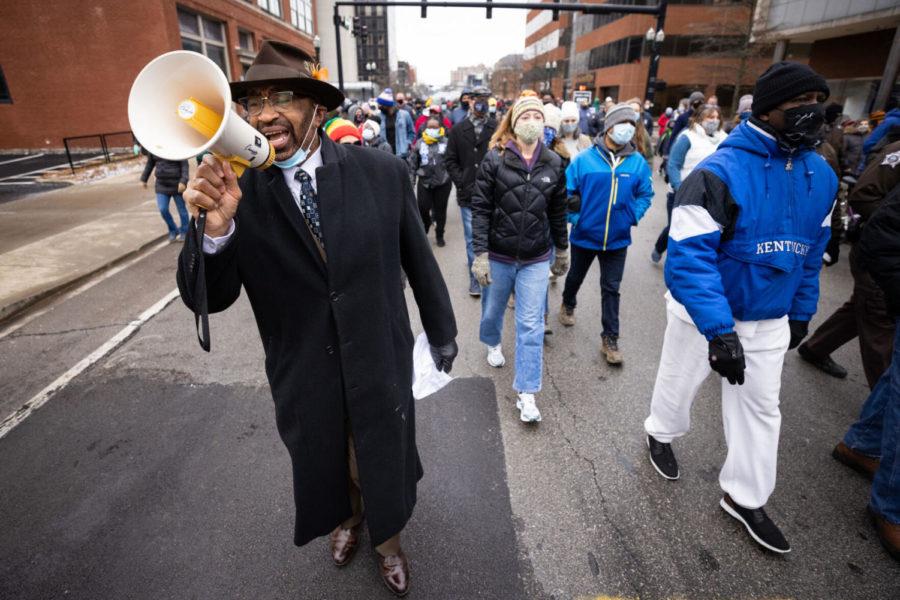 A man leads the marchers in song during the annual Holiday Freedom March on Monday, Jan. 18, 2021, in Lexington, Kentucky. Photo by Michael Clubb | Staff