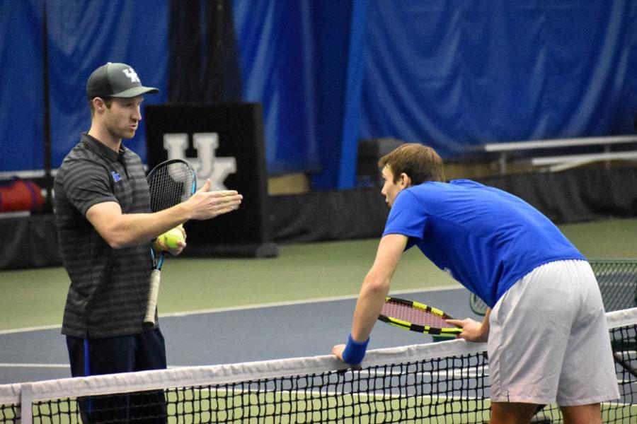 Cesar Bourgois and assistant coach Matthew Gordon run through a drill during warm-ups before the Kentucky vs. Notre Dame mens tennis match on Saturday, January 19, 2019 in Lexington, Kentucky. Photo by Natalie Parks | Staff