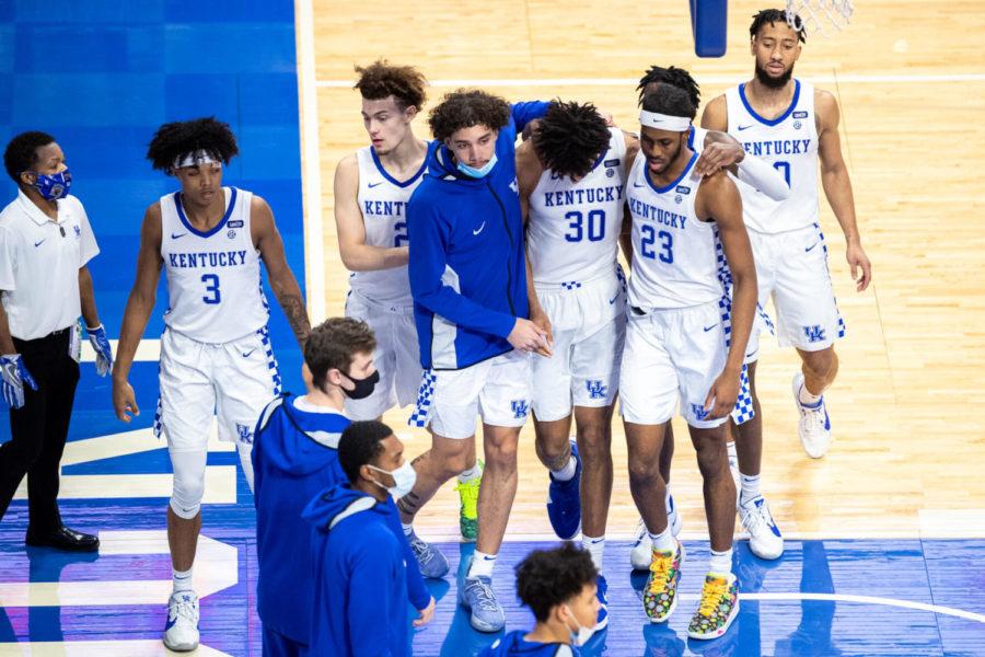 Kentucky+Wildcats+forward+Olivier+Sarr+%2830%29+walks+off+the+court+with+his+teammates+after+missing+a+game+winning+shot+during+the+University+of+Kentucky+vs.+Notre+Dame+basketball+game+on+Saturday%2C+Dec.+12%2C+2020%2C+at+Rupp+Arena+in+Lexington%2C+Kentucky.+Notre+Dame+won+64-63.+Photo+by+Michael+Clubb+%7C+Staff