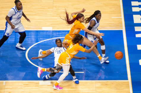 Kentucky Wildcats guard Chasity Patterson (15) is knocked down during a loose ball during the University of Kentucky vs. Tennessee women’s basketball game on Thursday, Feb. 11, 2021, at Rupp Arena in Lexington, Kentucky. Kentucky won 71-56. Photo by Jack Weaver | Staff